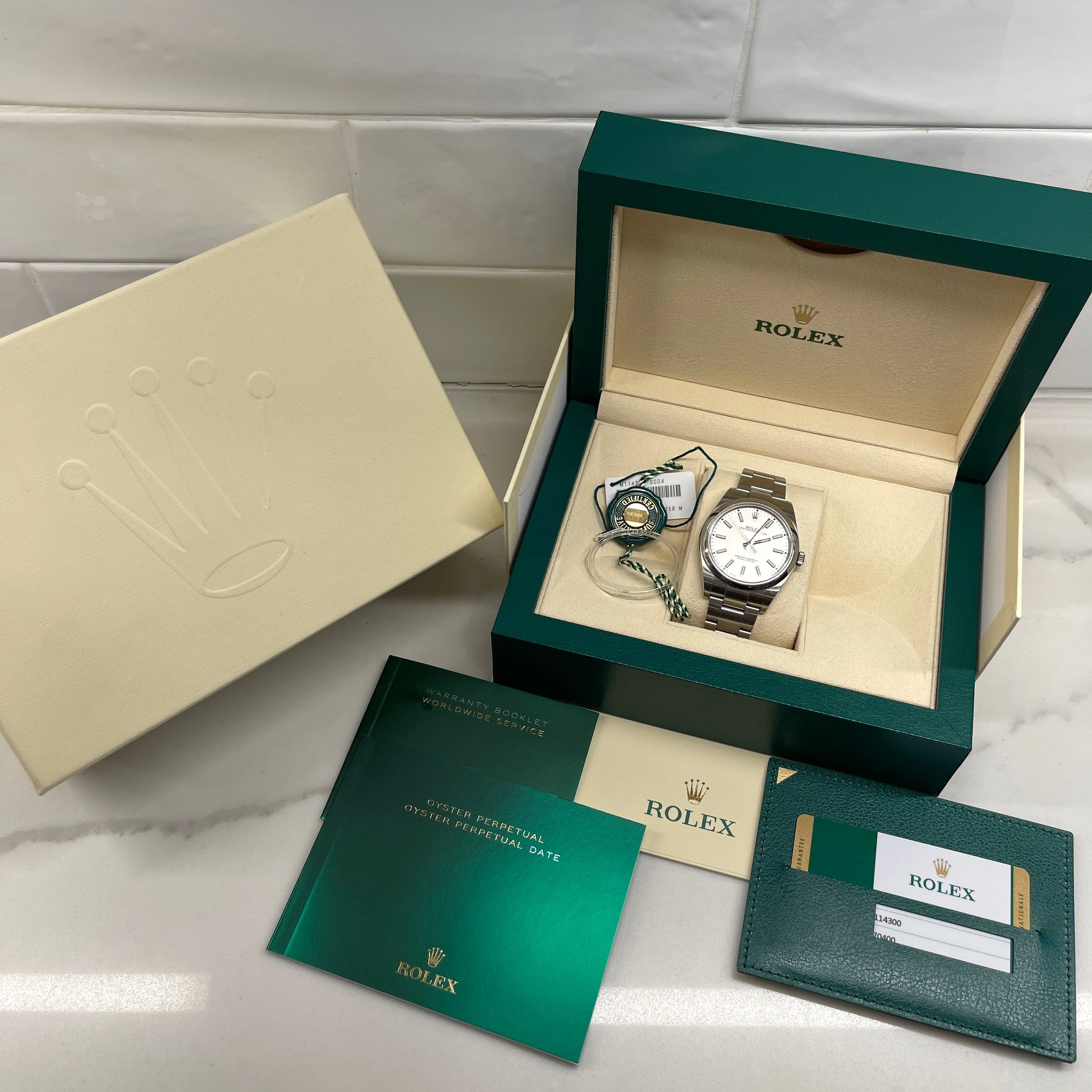 2019 Rolex Oyster Perpetual 114300 White 39mm Stainless Steel Wristwatch Box Papers