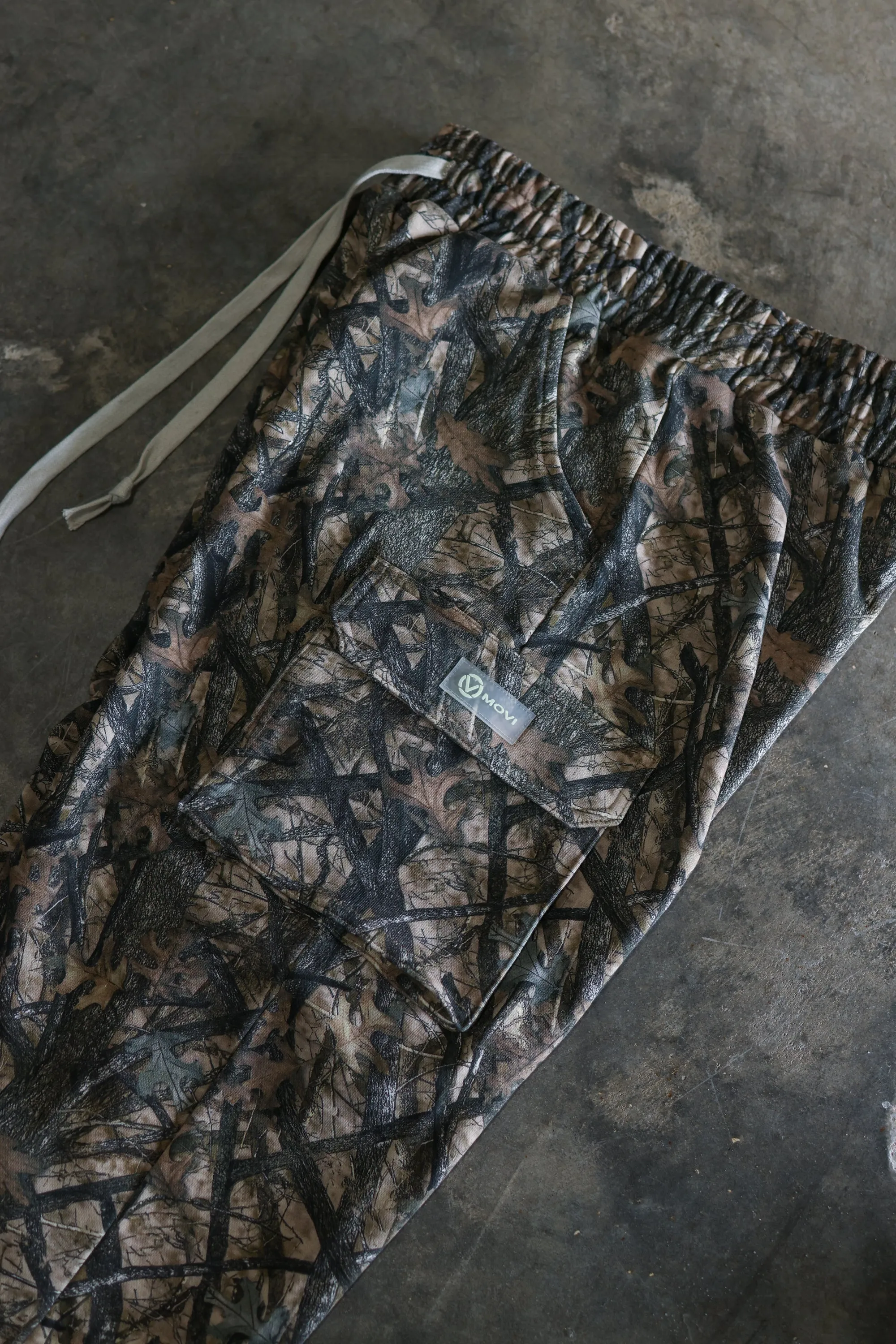 ORIGIN GLOW BAGGY CARGO SWEATS - TREE CAMO